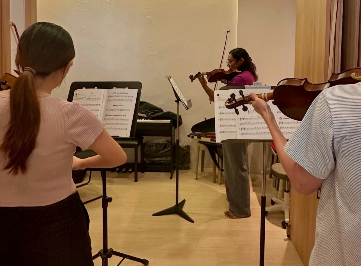 Students playing together in an in-house ensemble session